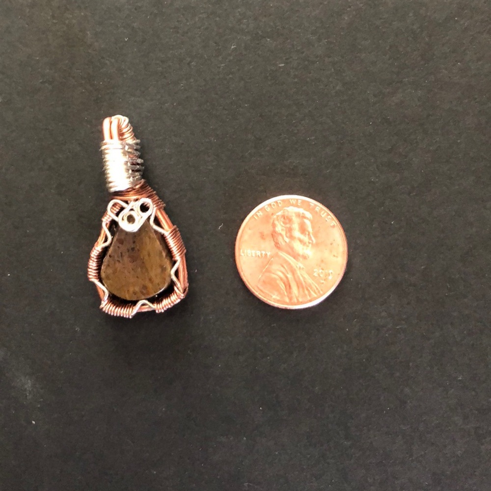 Handmade bone and wire wrapped pendant